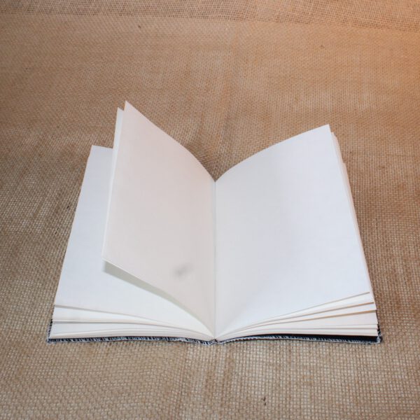 Handgemaakt donkergrijs canvas notitieboek met tekst van Ernest Shackleton