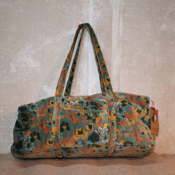 Reistas van groene velvet stof