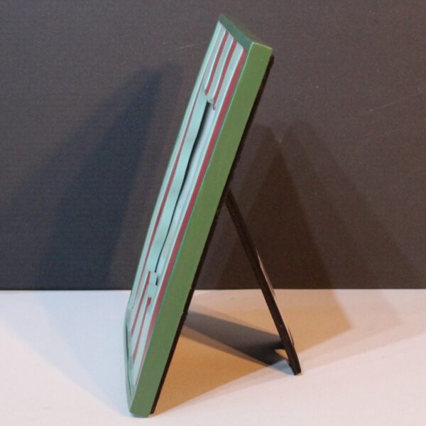 Rood groen gestreepte fotolijst met lieve Franse tekst "Bisou"