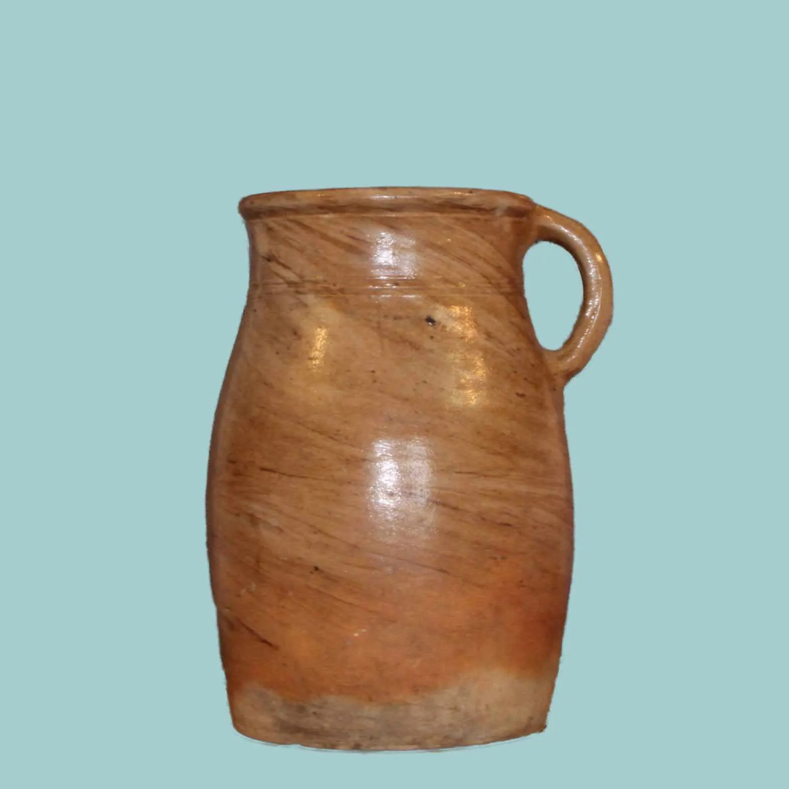 Bruine geglazuurde grespot met oor