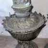 Brocante bronzen olielamp waarvan de voet bewerkt is met een cherubijn