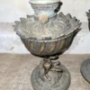 Brocante bronzen olielamp waarvan de voet bewerkt is met een cherubijn